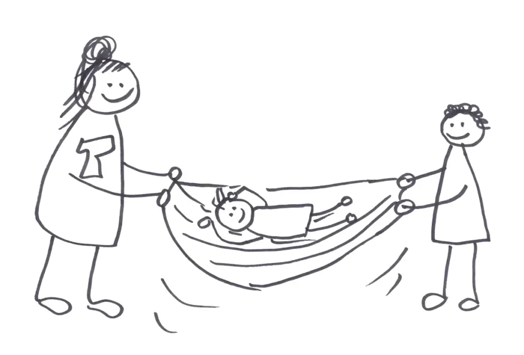 A simple line drawing showing a researcher and a child cheerfully holding and rocking a piece of fabric, with a smaller child lying on it.